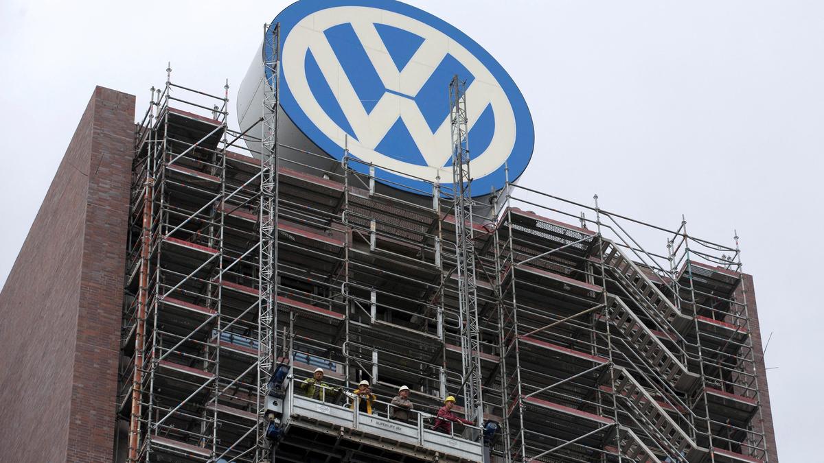 Volkswagen says cutting 100,000 jobs by end of decade