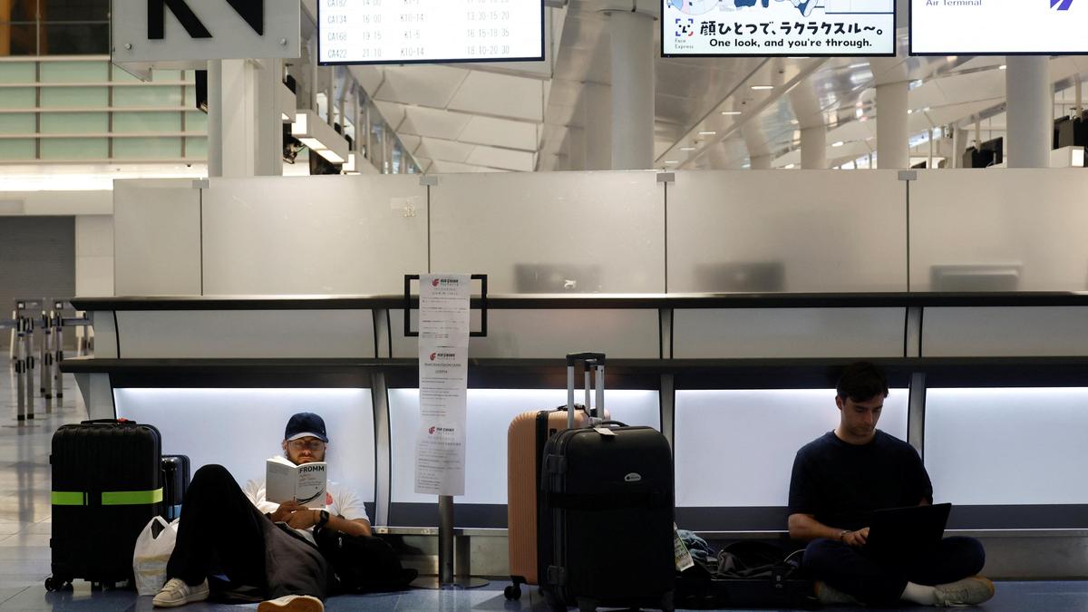 Flights scrapped, evacuations urged as Typhoon Dujuan wallops Japan