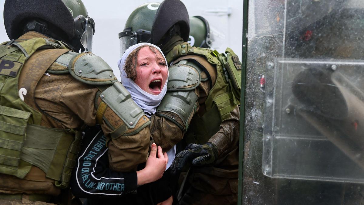 Chile arrests 284 in protests condemning Pinochet dictatorship