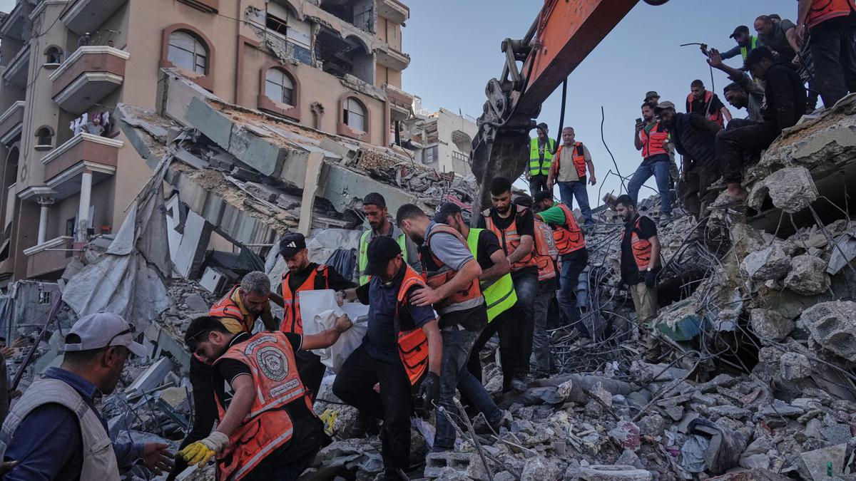 War-damaged Gaza building collapses, killing 20 people sheltering inside