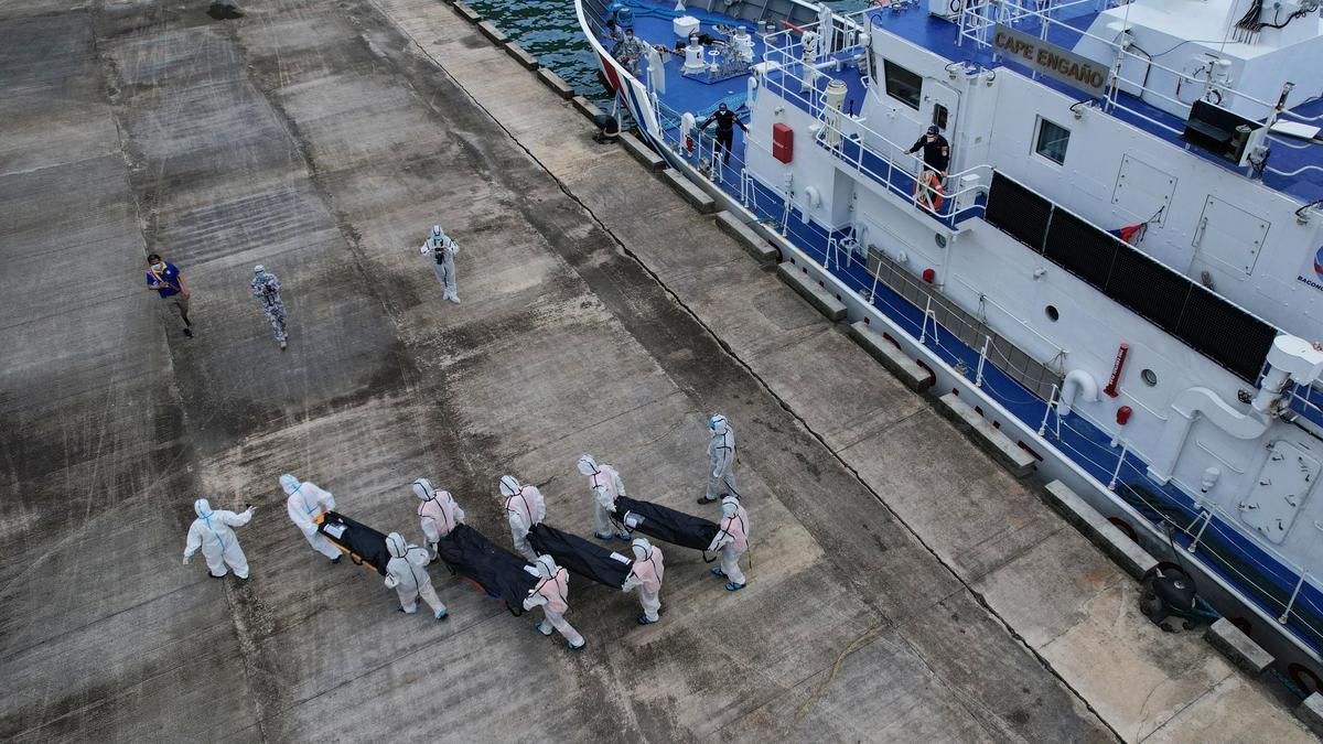 Philippines begins identifying victims from ferry fire as dozens still missing