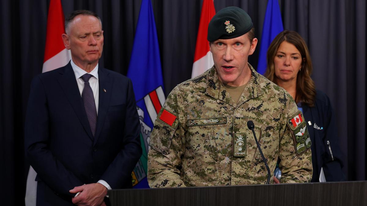 Grass fire at Canadian military base kills , critically injures soldiers